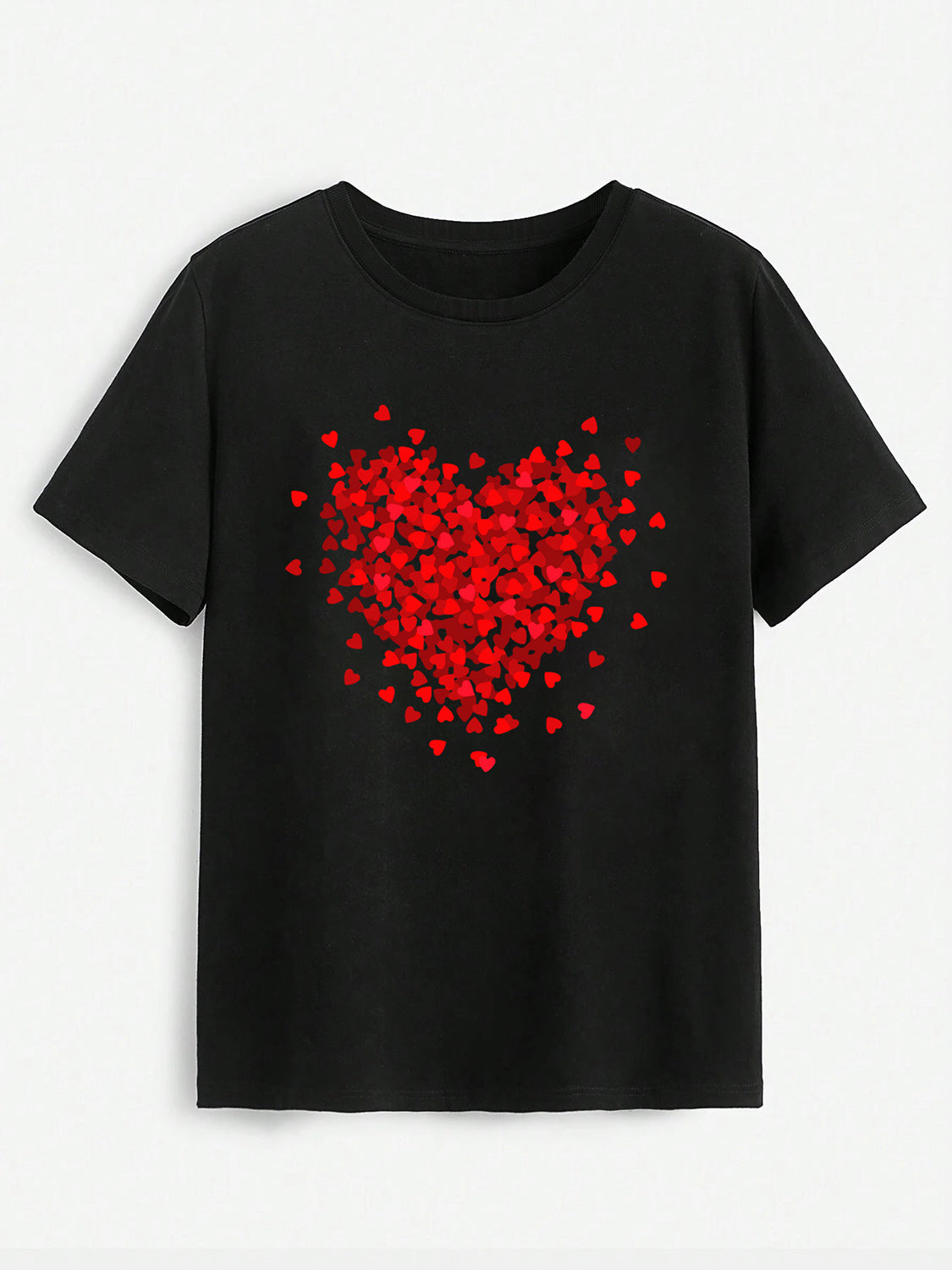 Black t-shirt with red heart design, flat lay