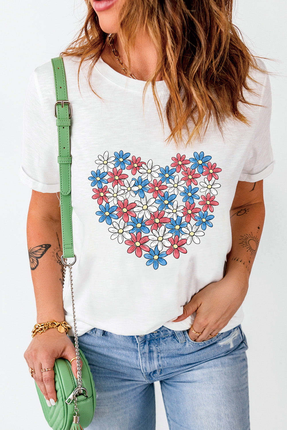 Round neck T-shirt featuring colorful flower heart design.