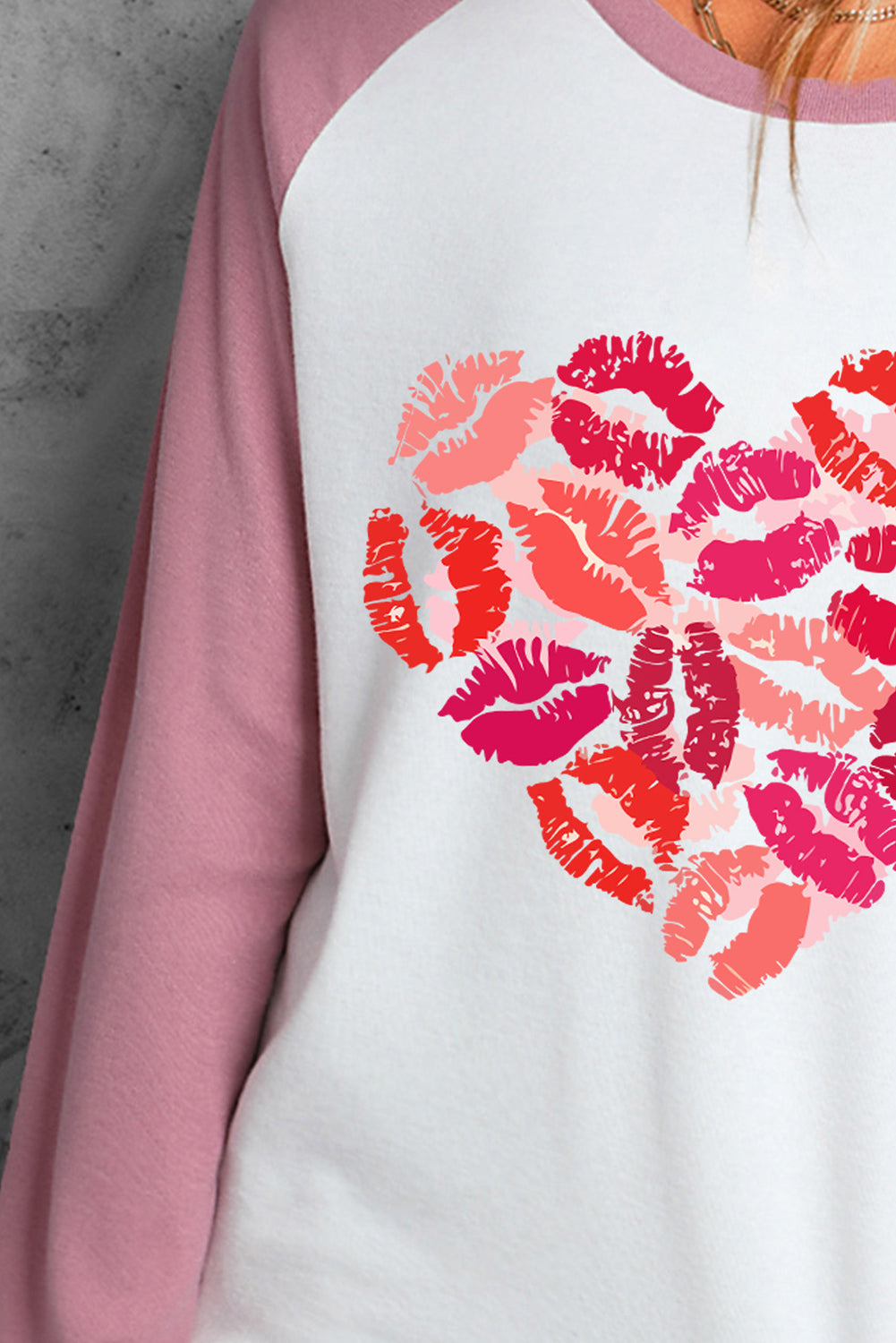 Close-up of lip graphic on round neck long sleeve T-shirt