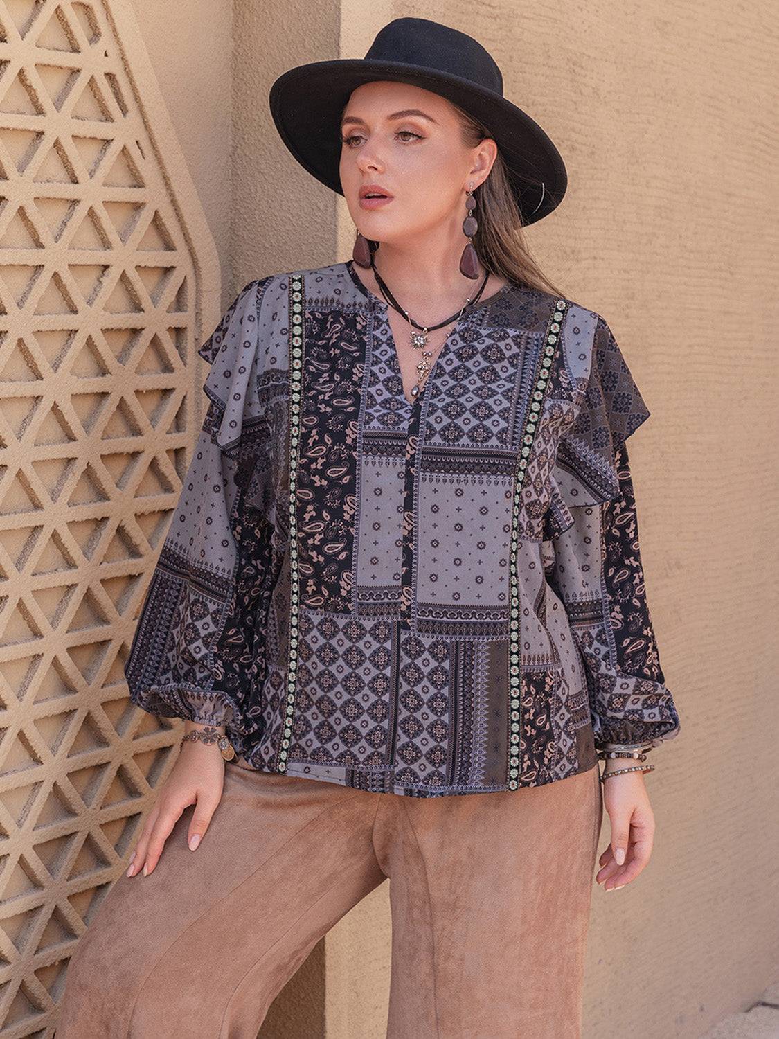 Plus size ruffled printed blouse with notched long sleeves