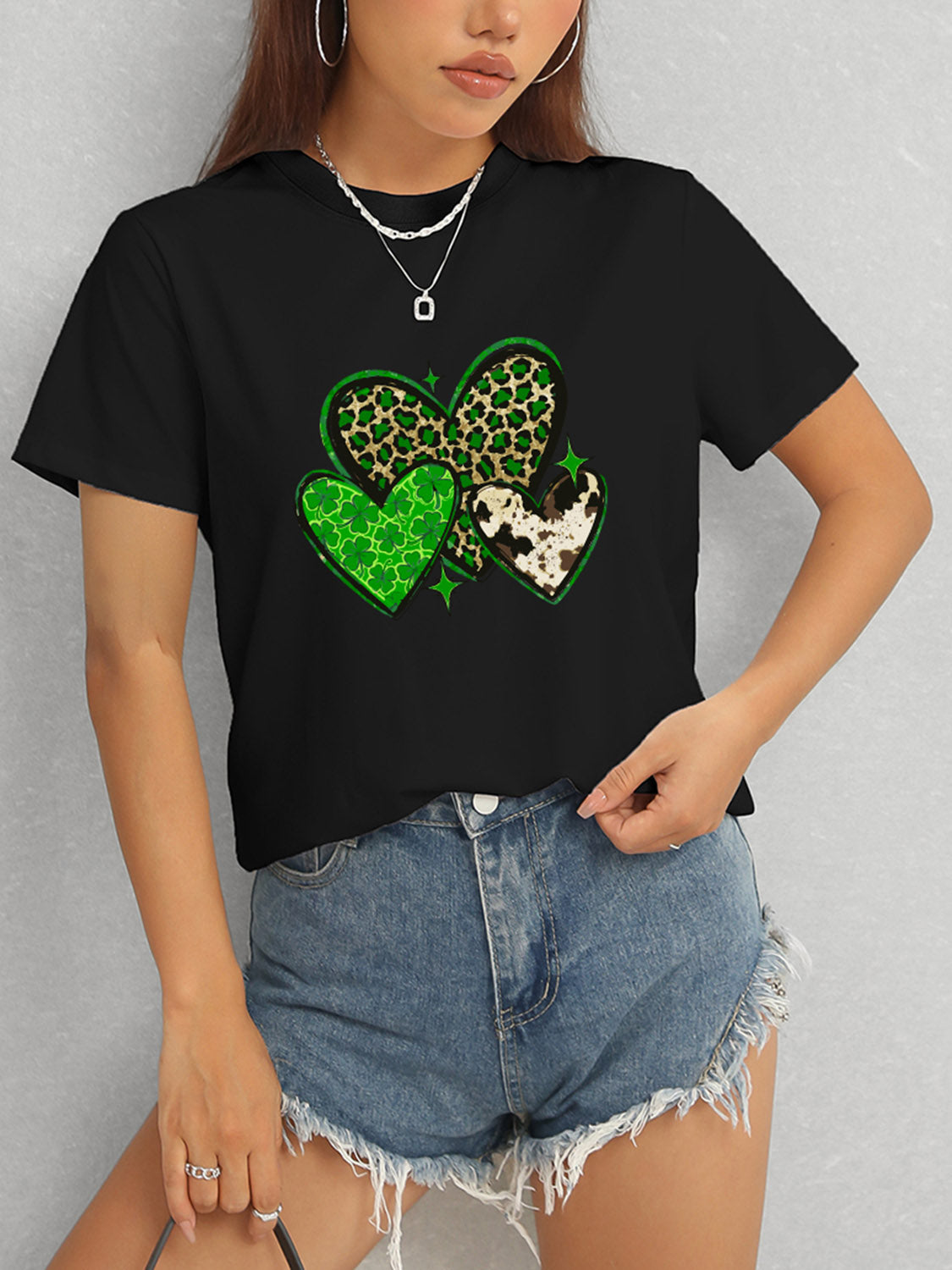 Black t-shirt with green heart and leopard print