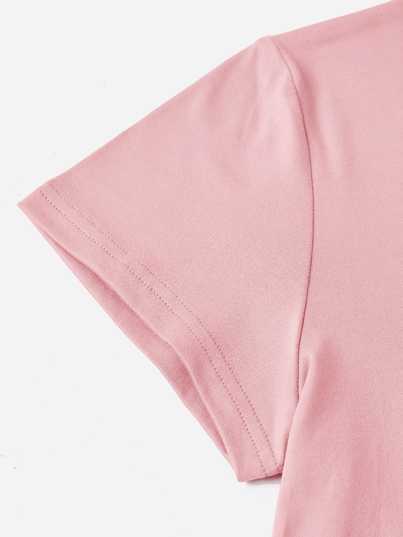 Close-up of pink short sleeve t-shirt fabric