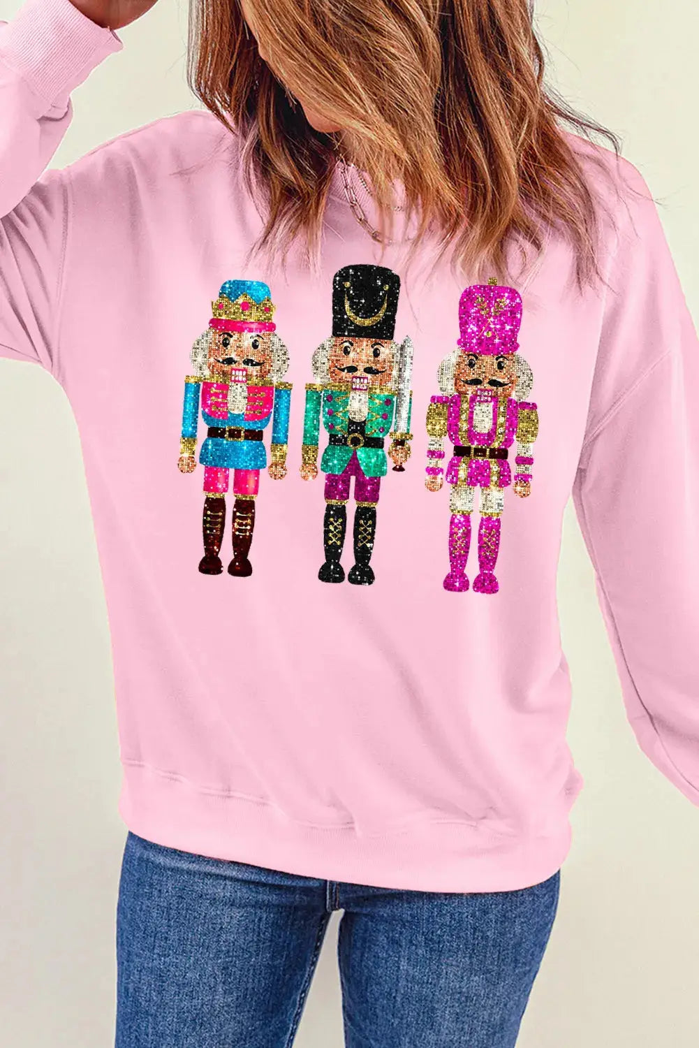 Long sleeve pink sweatshirt with nutcracker print