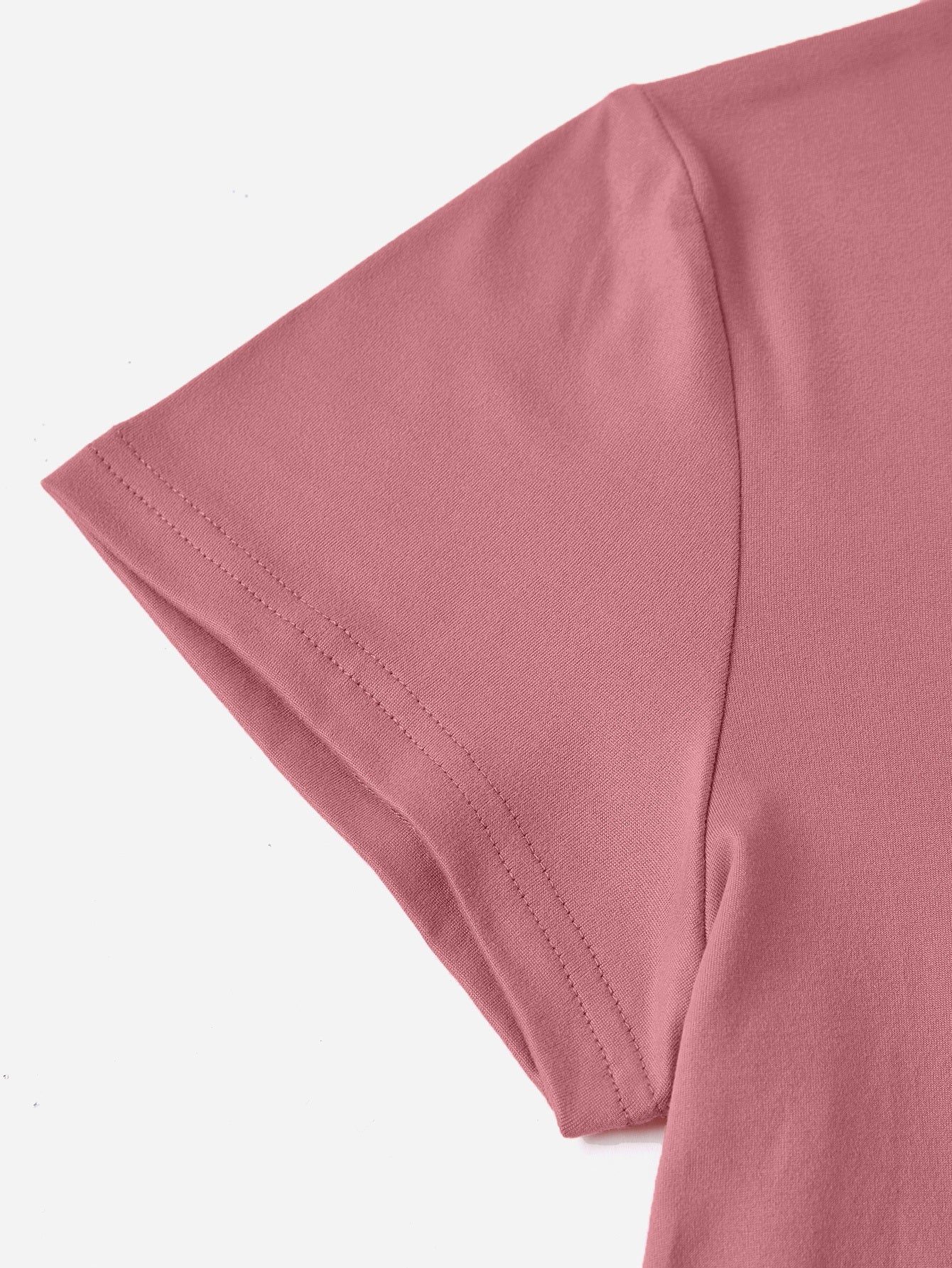 Close-up of mauve short sleeve t-shirt fabric