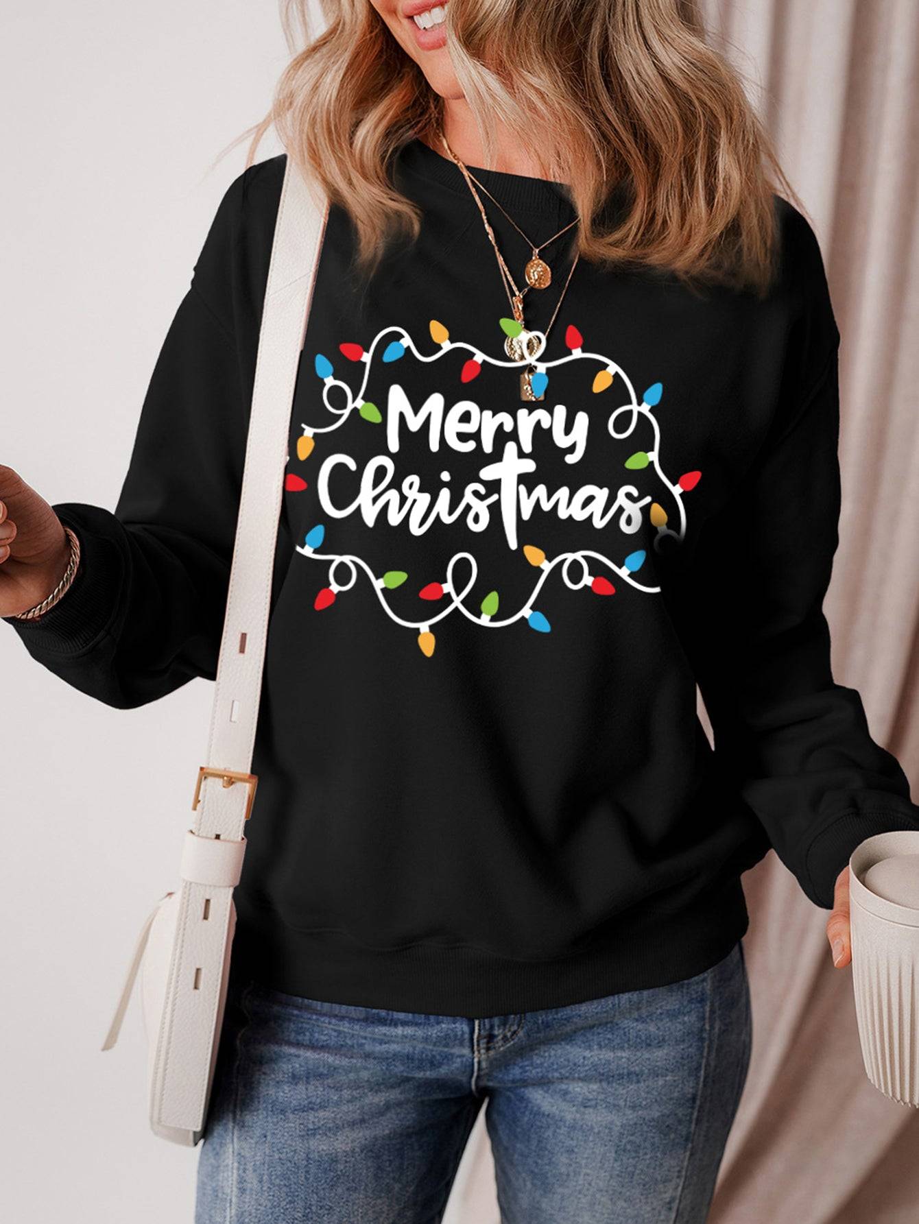Festive Merry Christmas sweatshirt featuring light string design.
