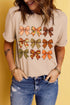 Beige T-shirt with colorful bow graphic design, round neck.