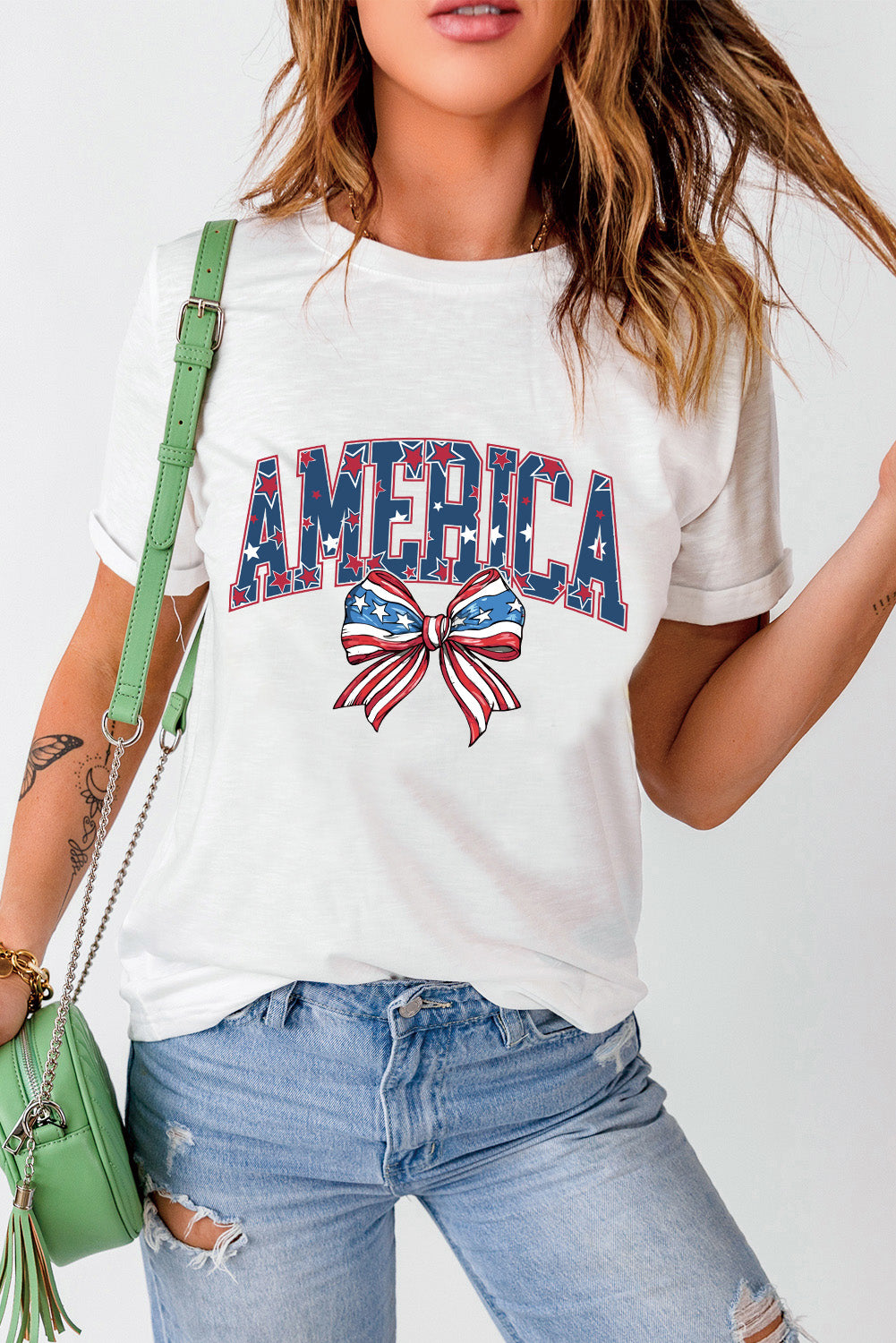 White T-shirt with AMERICA print and bow, front view