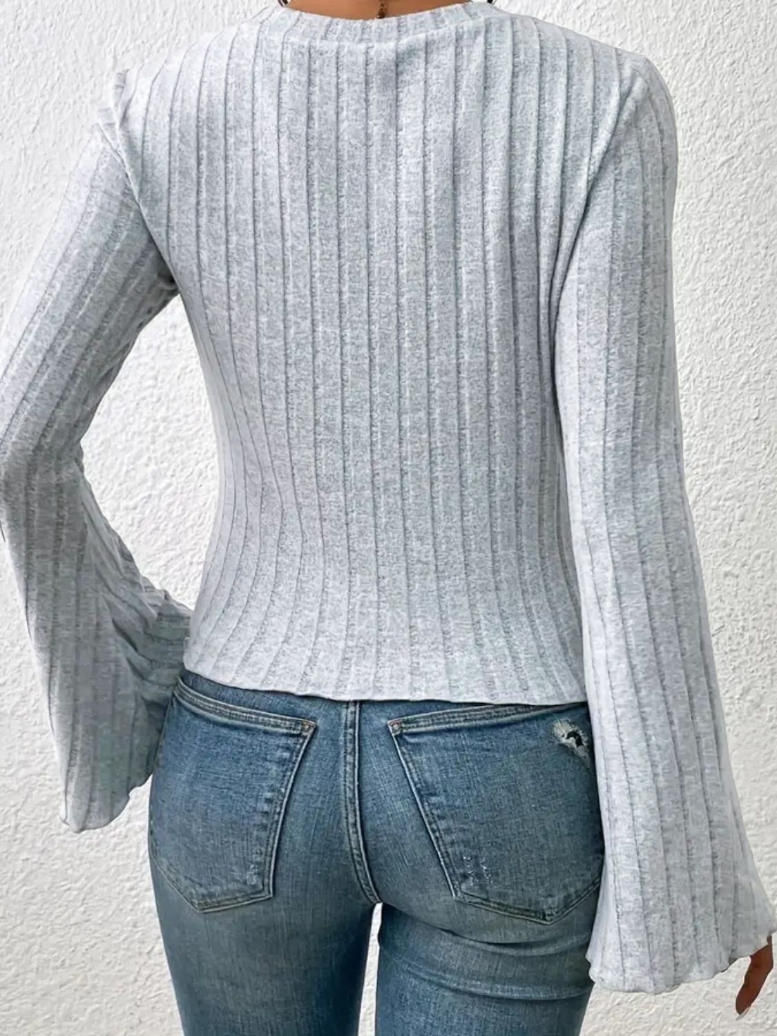 Back view of gray ribbed flare sleeve t-shirt