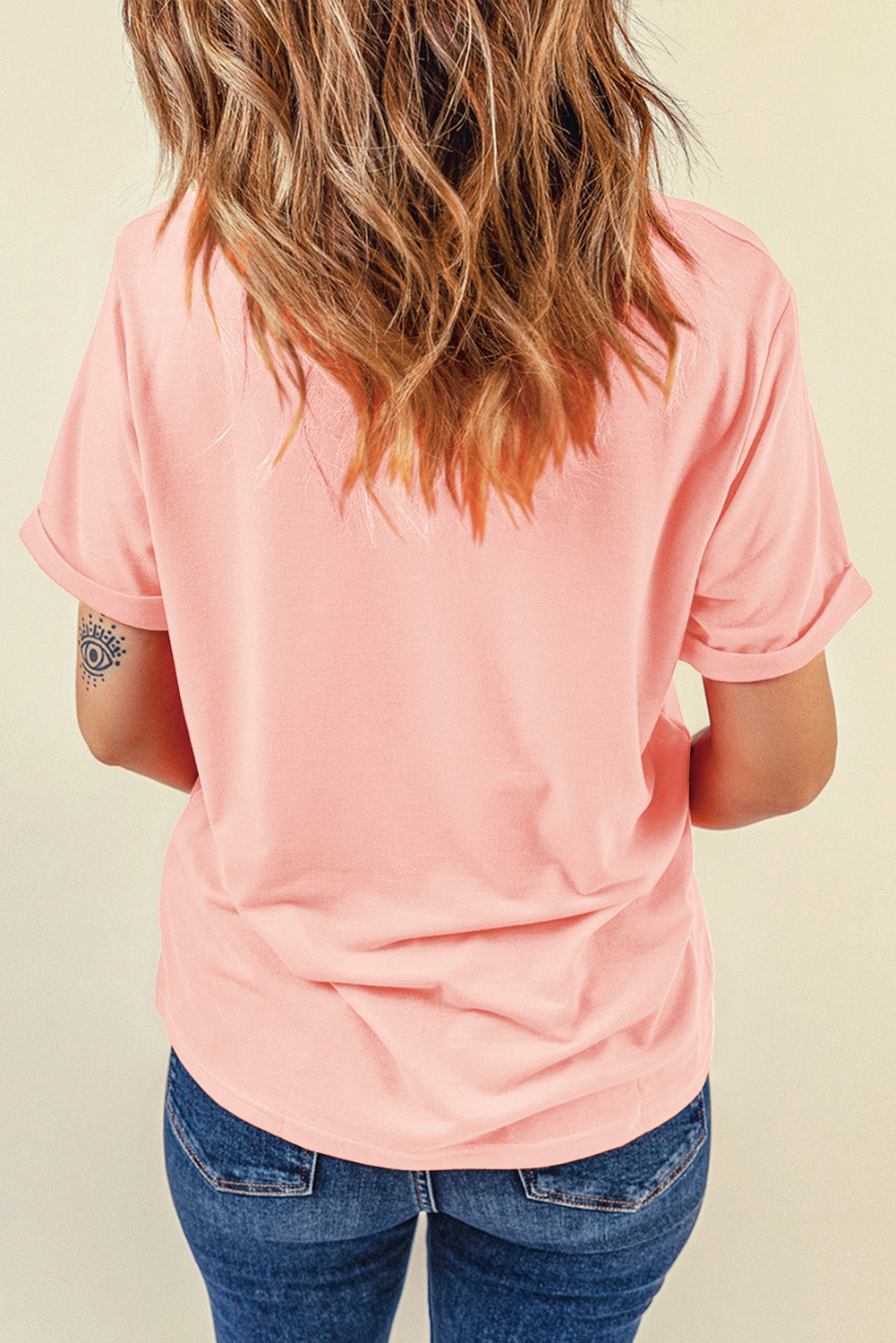 Back view of pink round neck T-shirt, short sleeves