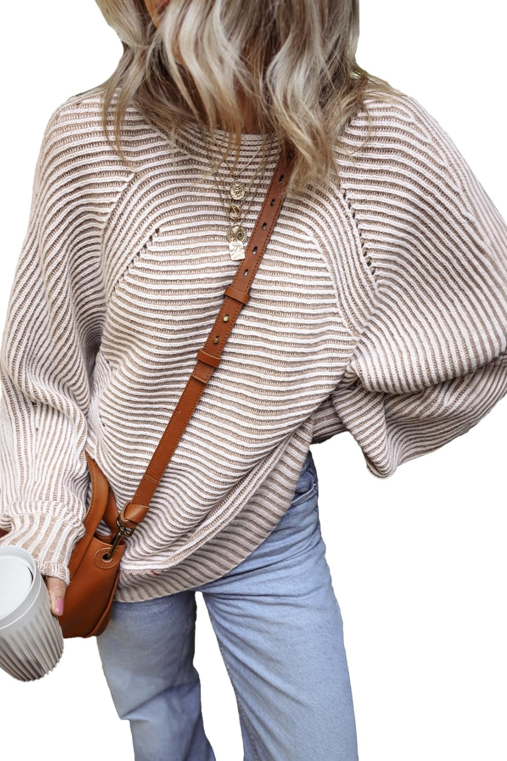 Beige textured striped top with brown bag