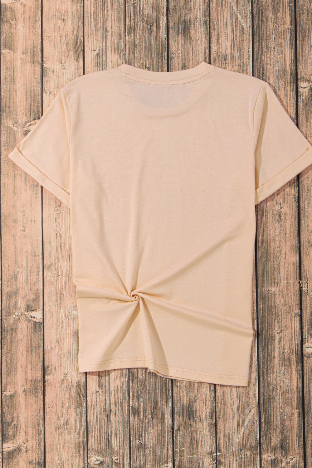 Back of heart graphic round neck short sleeve t-shirt on wood