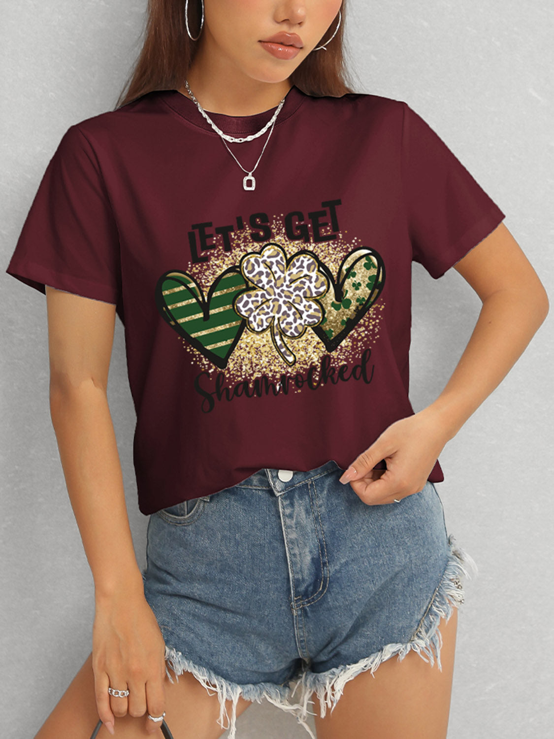 Maroon T-Shirt Featuring Shamrock Design and Denim