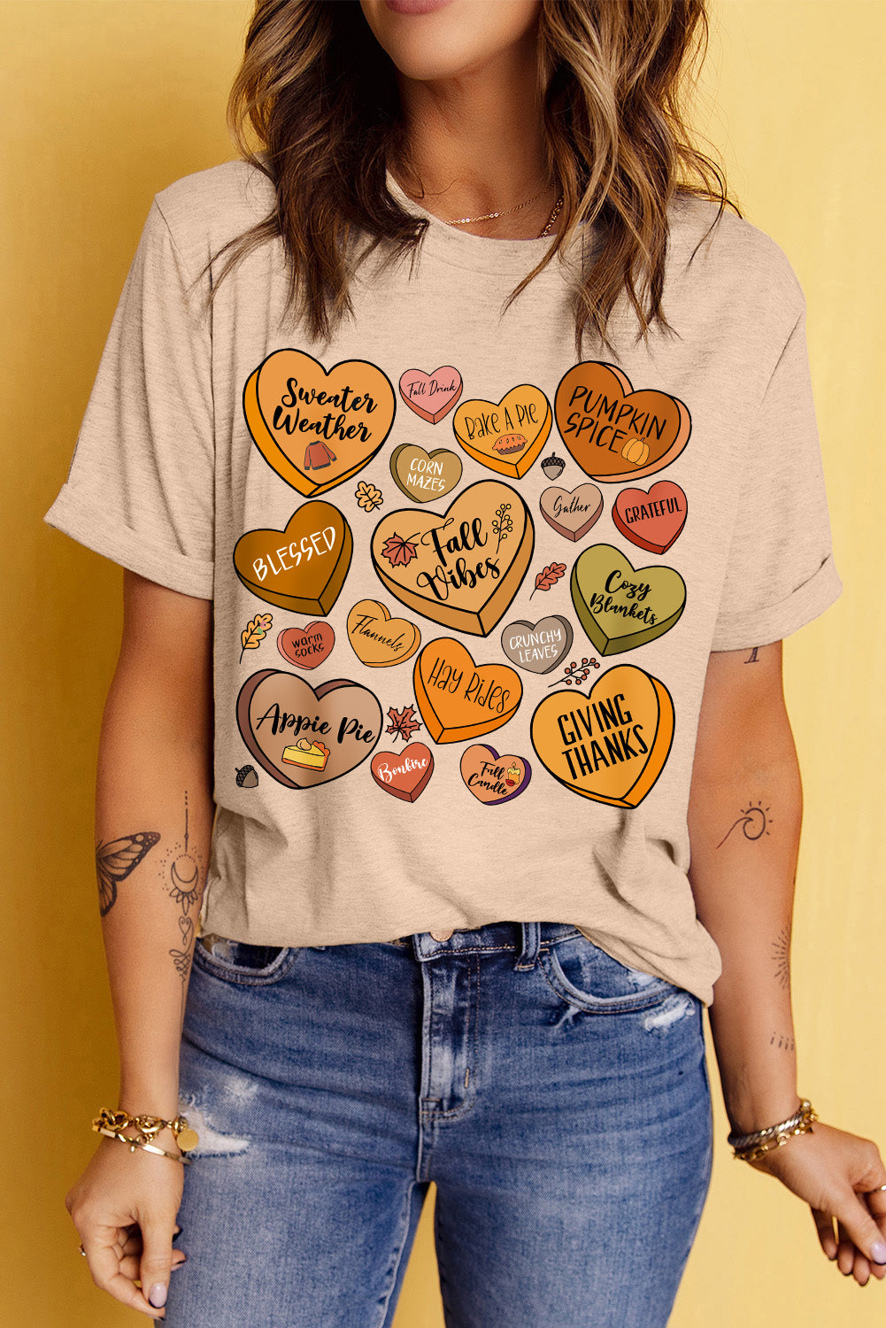 Model wearing heart graphic round neck short sleeve t-shirt