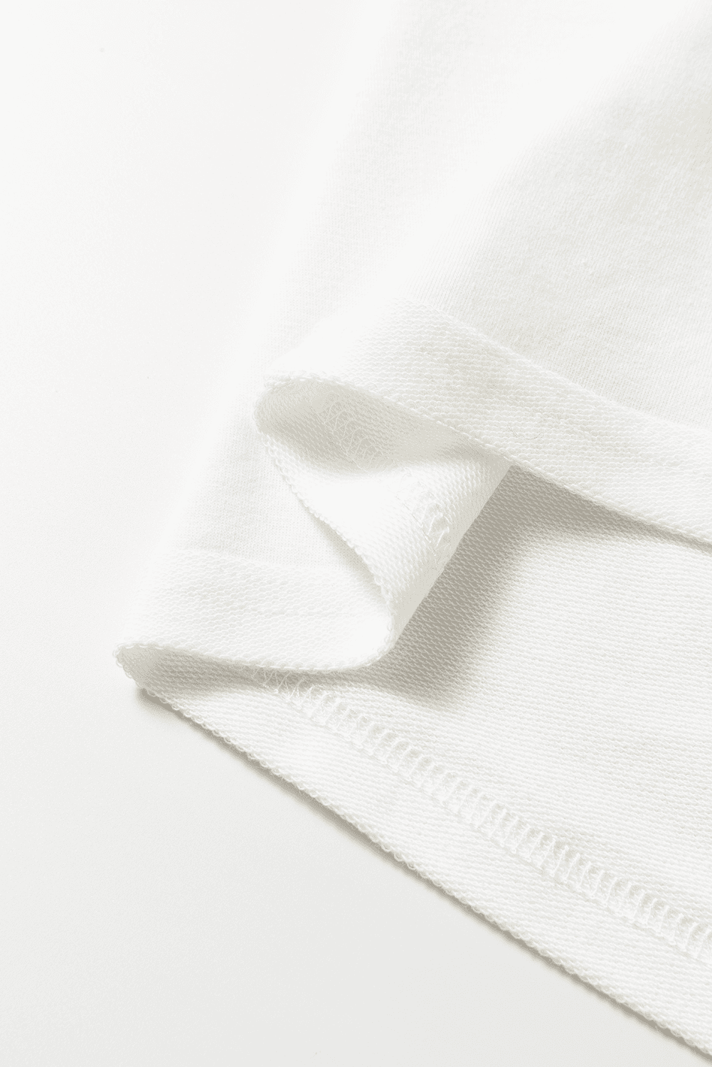 Close-up of number 76 print on fabric