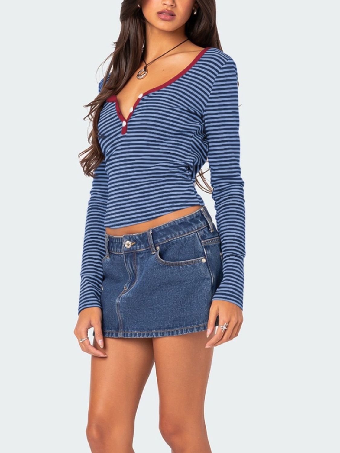 Side view of navy and white striped T-shirt with maroon trim
