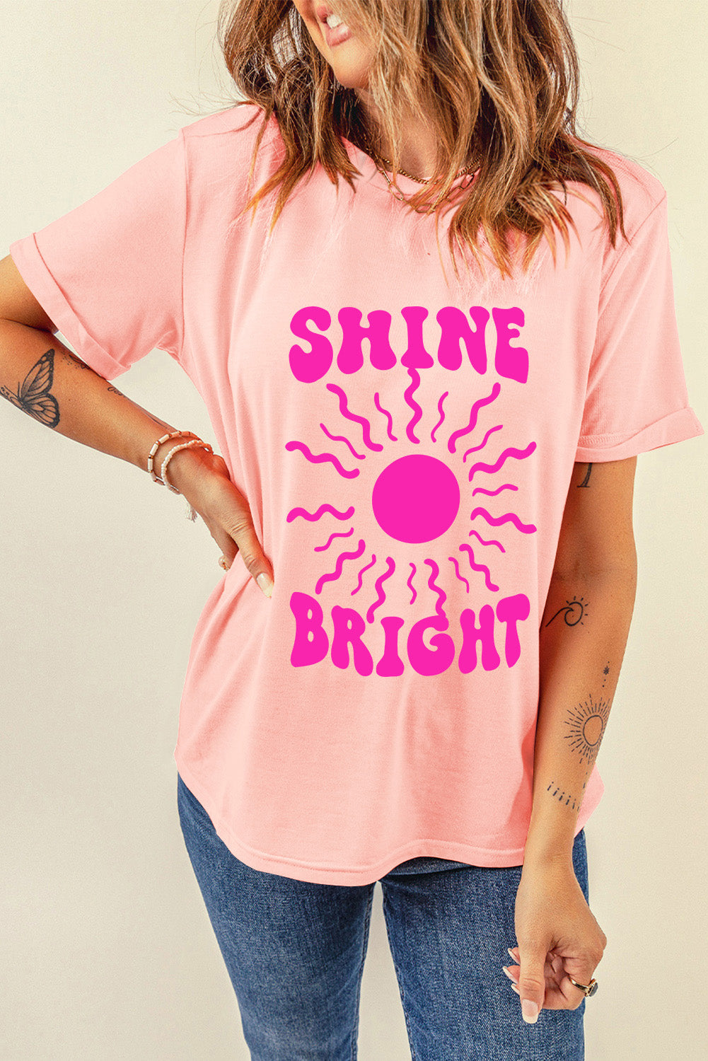 Model wearing SHINE BRIGHT T-shirt, side pose
