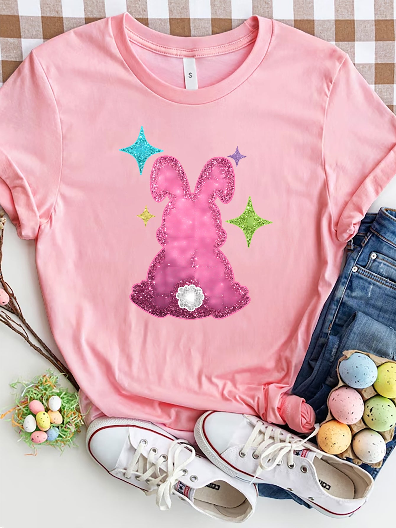 Pink T-shirt with pink rabbit design and colorful stars