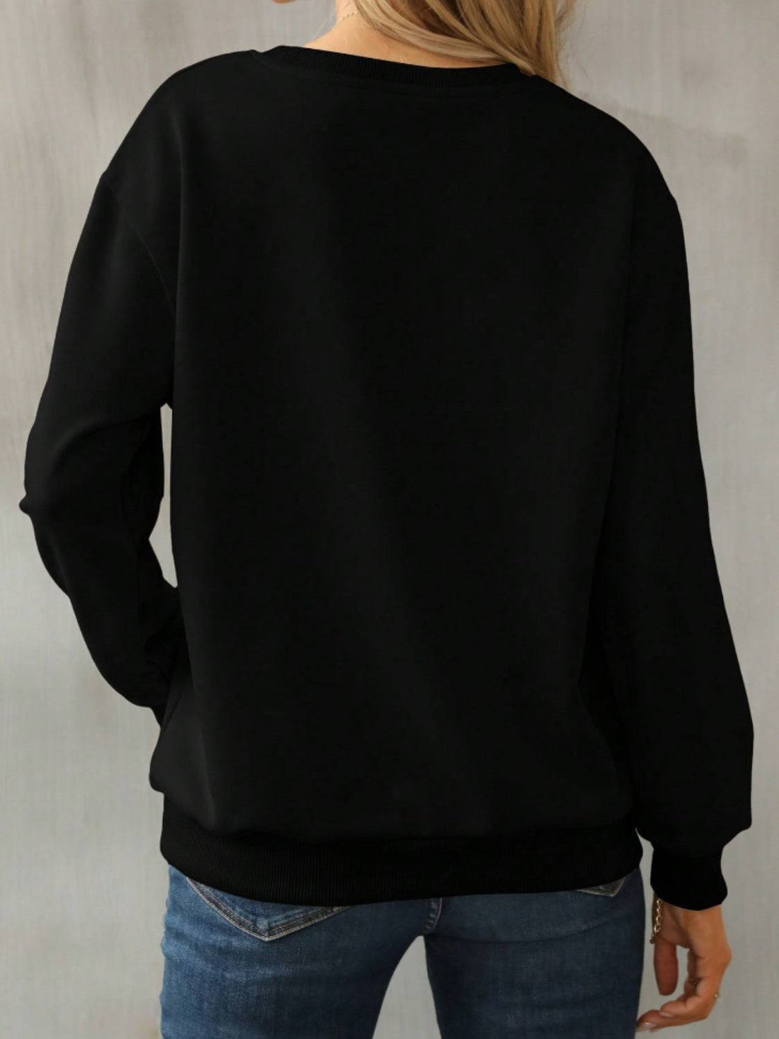 Black long sleeve sweatshirt back view