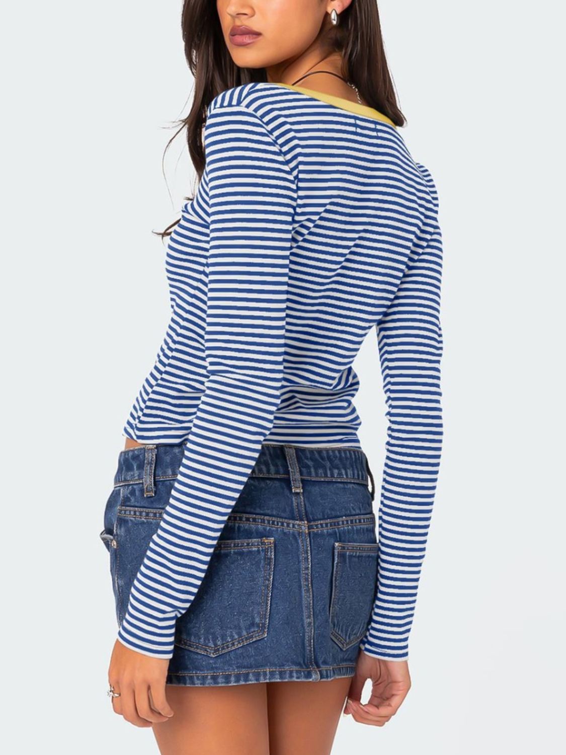 Back view of blue and white striped T-shirt with yellow trim