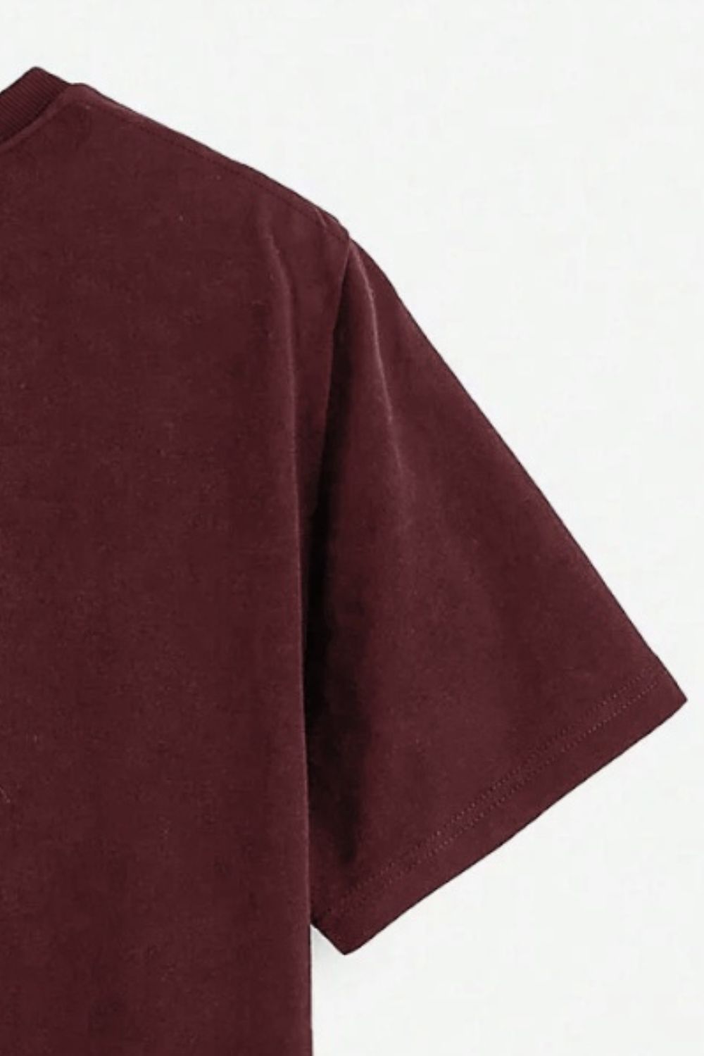 Close-up of burgundy T-shirt sleeve