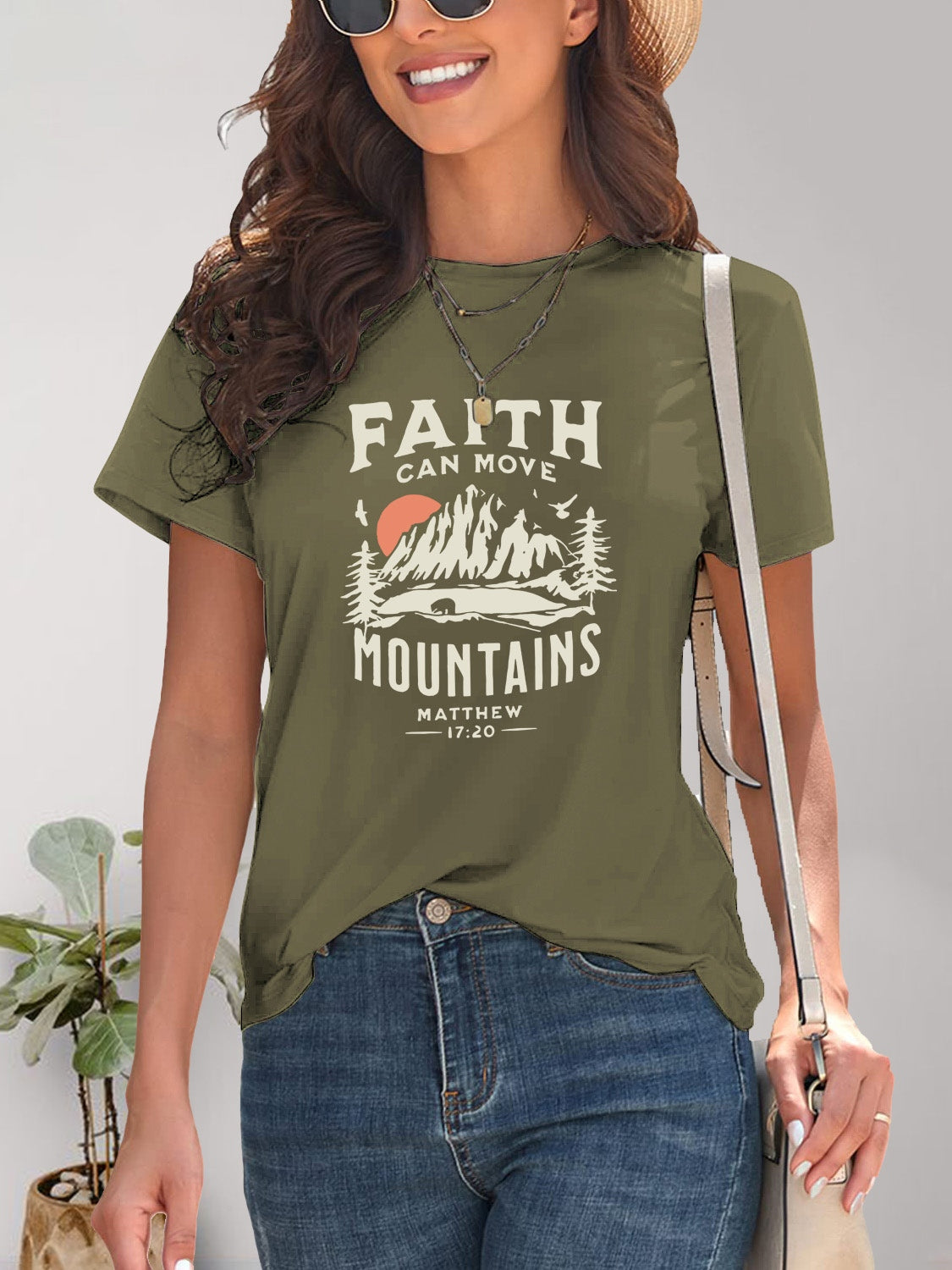 Green t-shirt with mountain graphic design