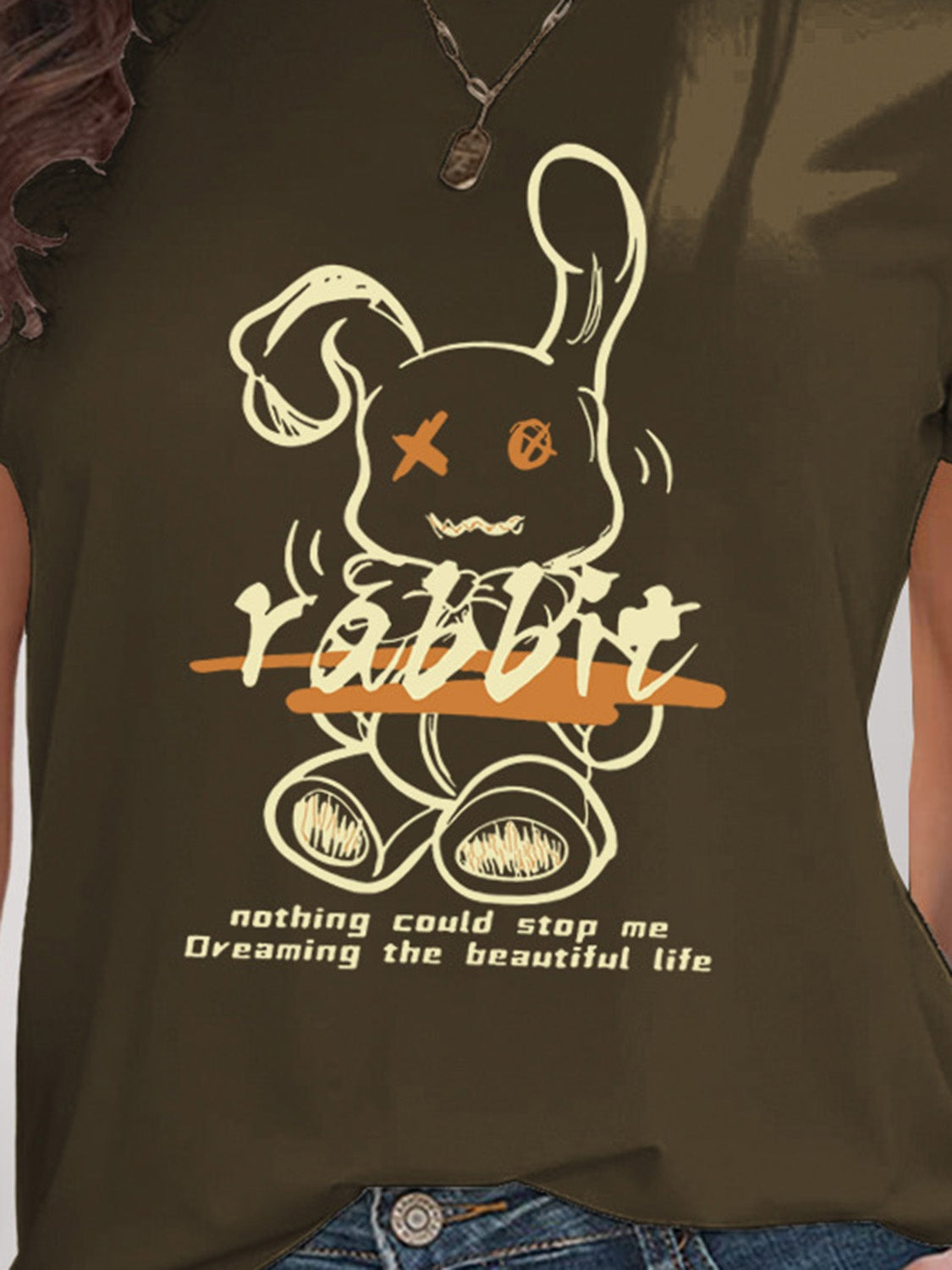 Close-up of dark olive rabbit graphic on t-shirt