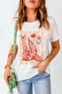 Graphic T-shirt with cowboy boots and hat design