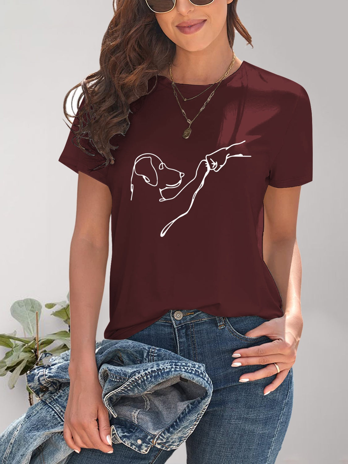 Burgundy dog graphic round neck t-shirt styled with accessories