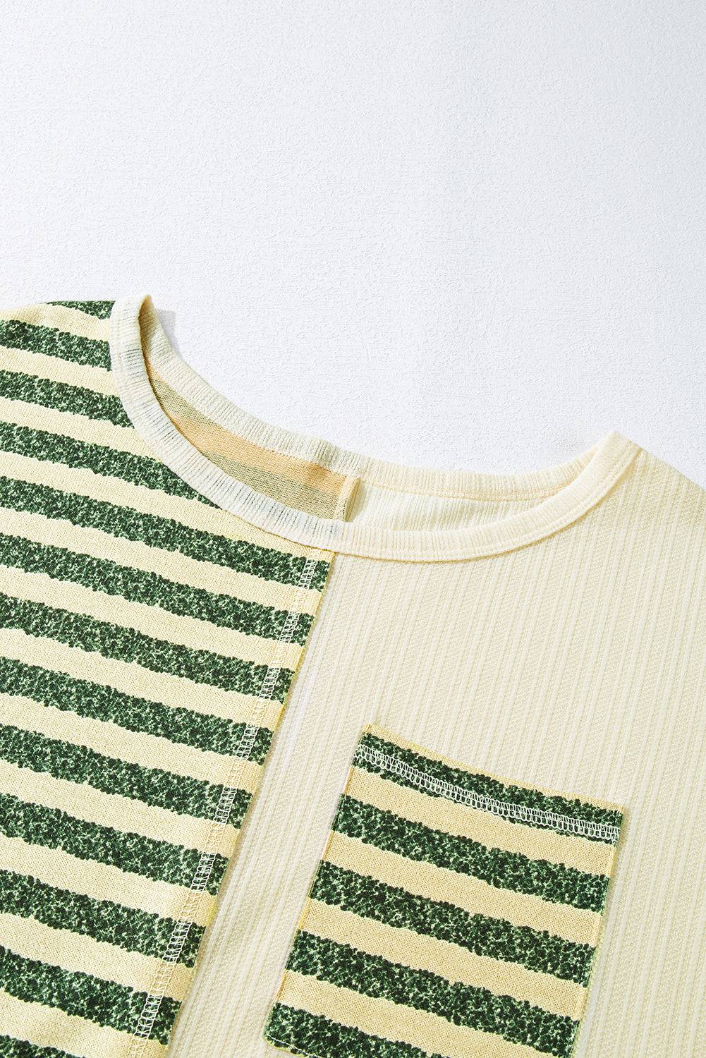 Neckline and pocket detail of striped top
