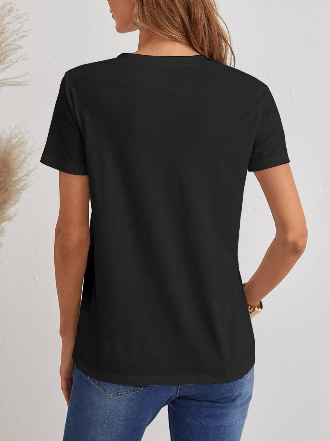 Back view of black FAM-FAM Cat V-Neck T-Shirt