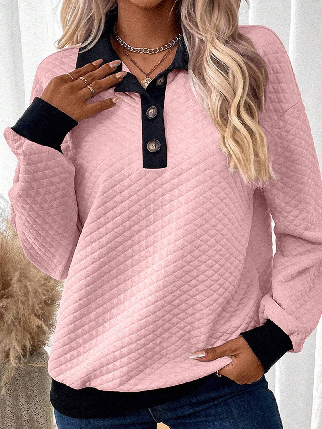 Pink texture quarter button long sleeve sweatshirt, side view