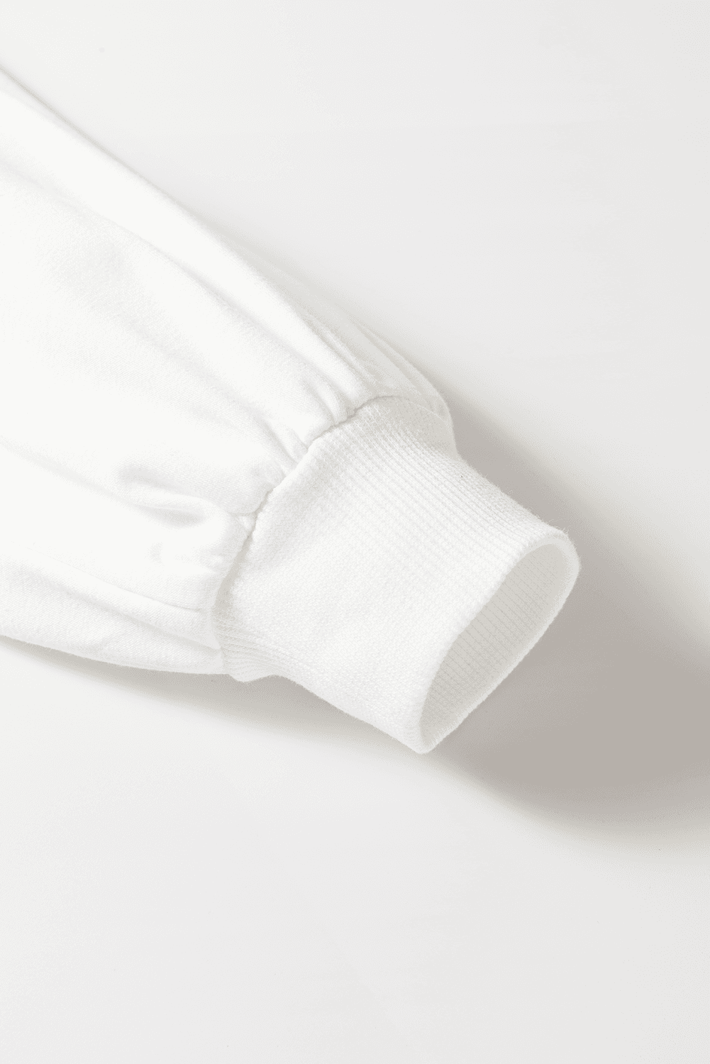 Detail of sleeve cuff on number 76 top