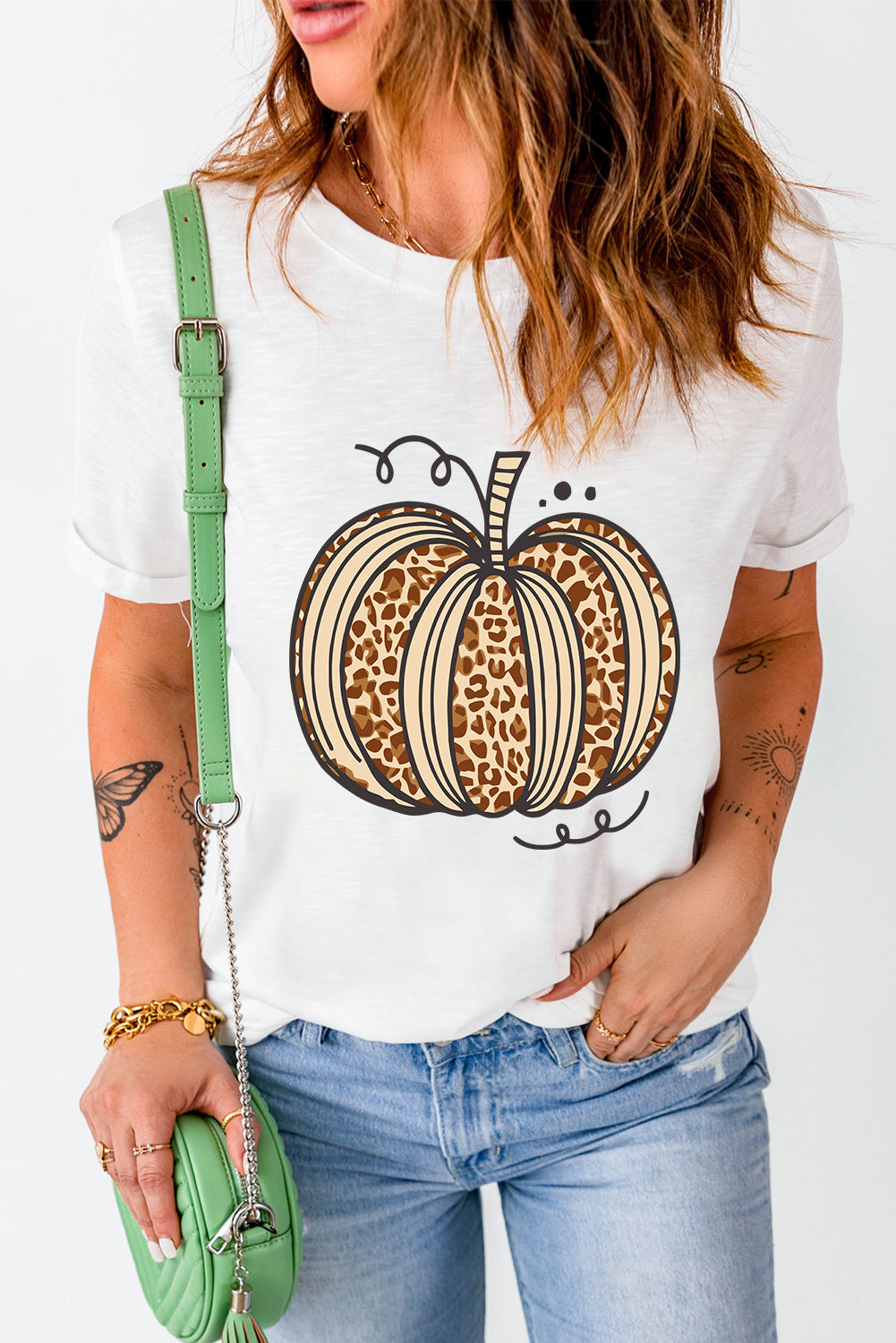 Stylish pumpkin graphic T-shirt with rolled sleeves