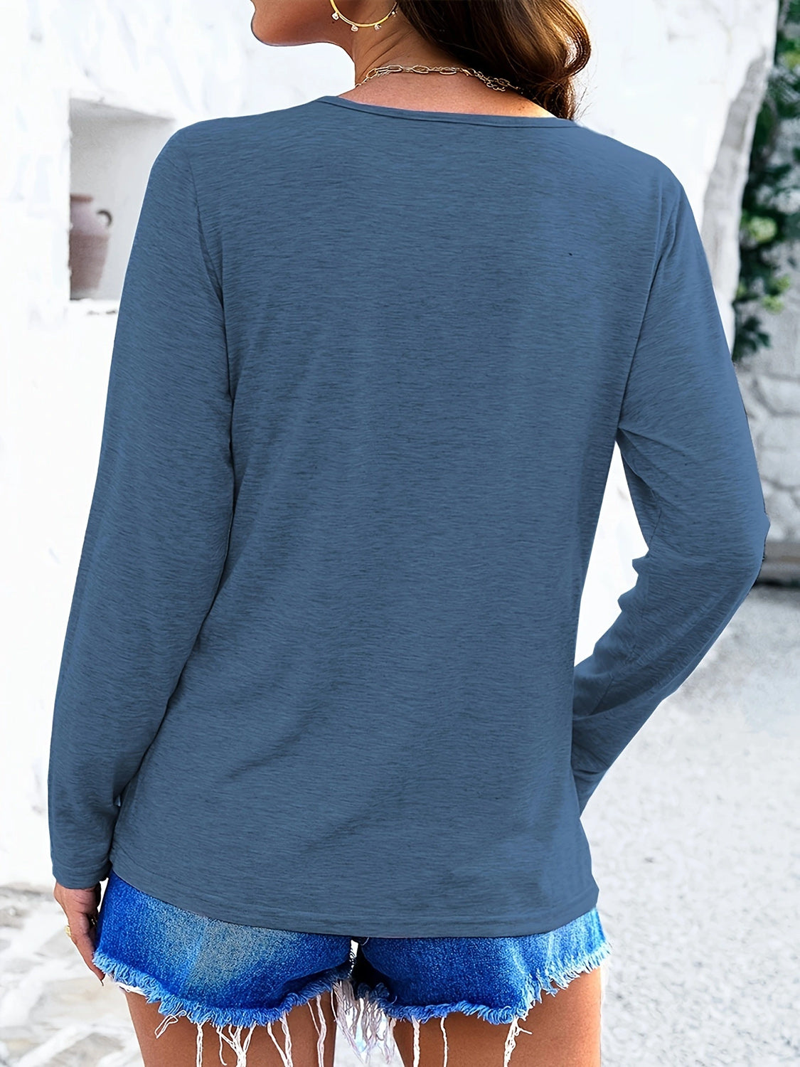 Blue crisscross V-neck long sleeve T-shirt, back view