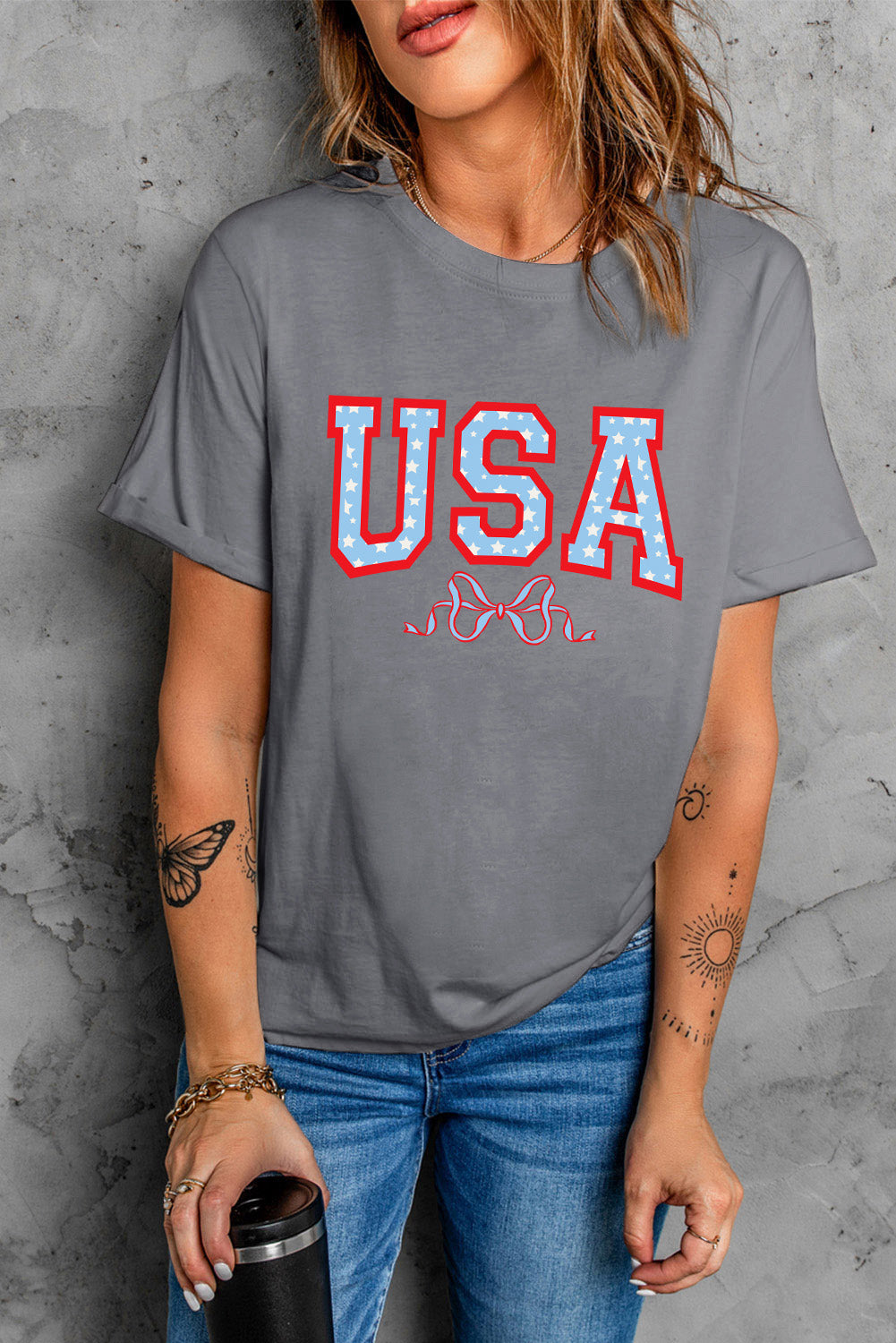 Gray USA round neck short sleeve t-shirt worn by woman
