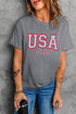 Gray USA round neck short sleeve t-shirt worn by woman