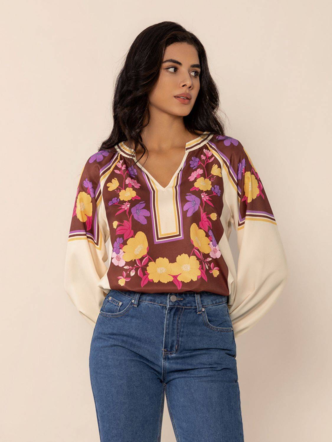 Front view of floral printed notched blouse