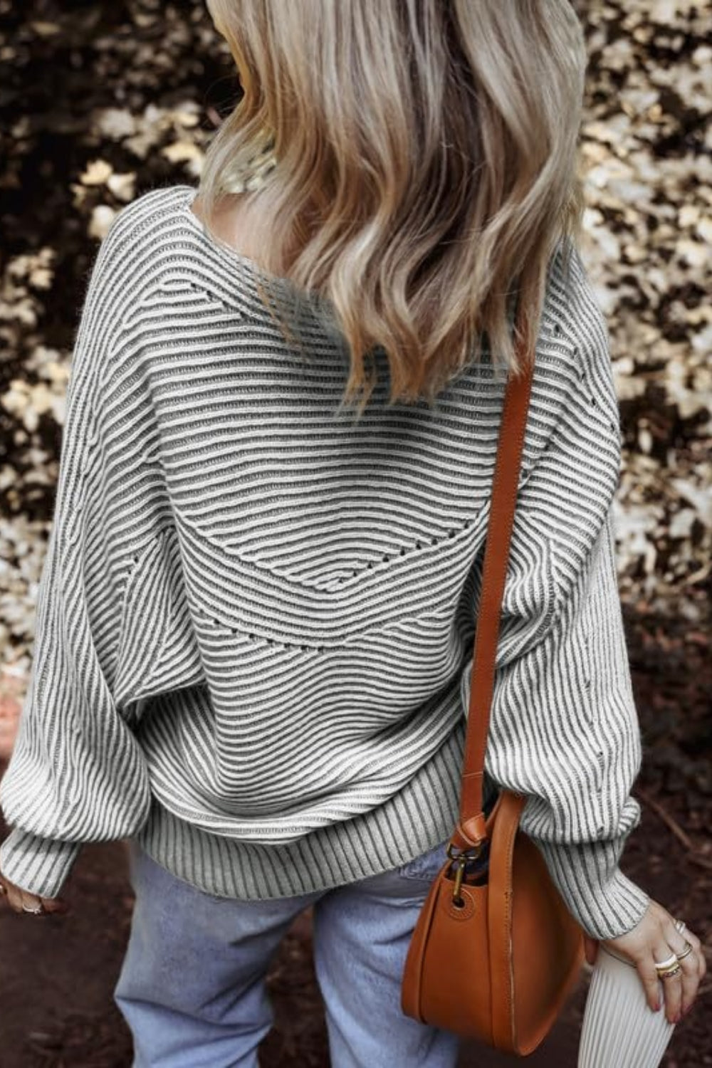Back view of gray textured striped long sleeve top