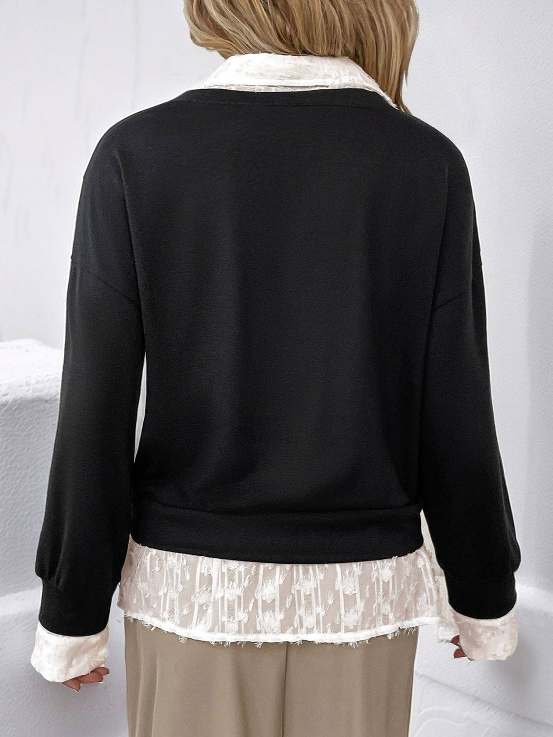 Back view of Perfee faux layered contrast sweatshirt