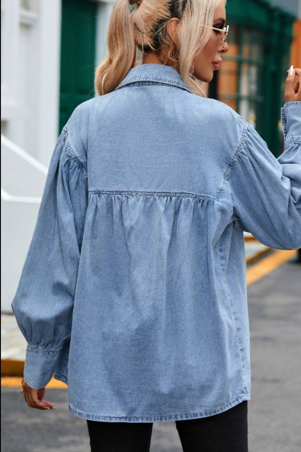 Back view of collared neck lantern sleeve denim top