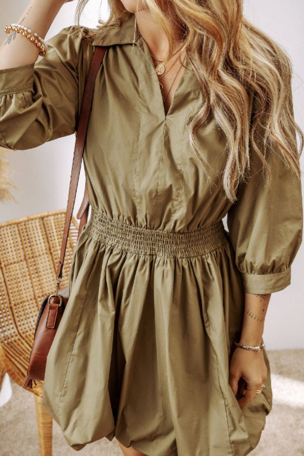 Front view of three-quarter sleeve mini dress