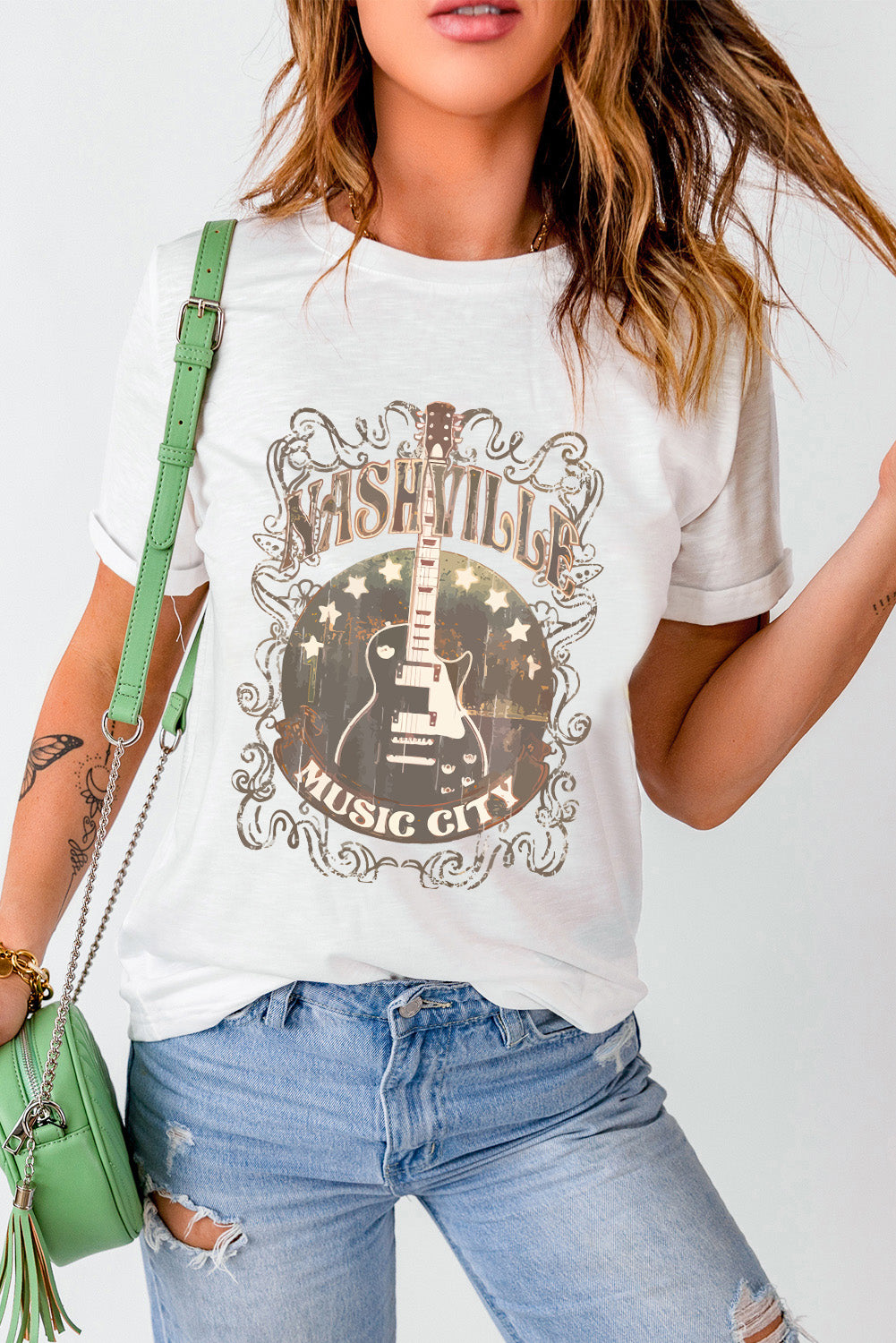 White t-shirt with Nashville guitar graphic design