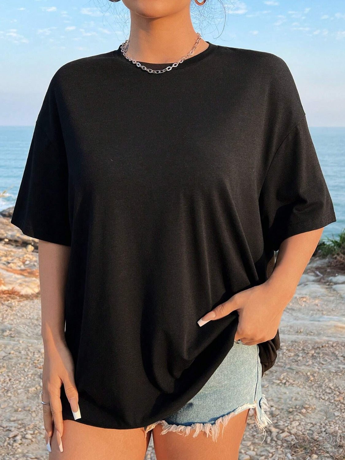 Front view of black round neck T-shirt