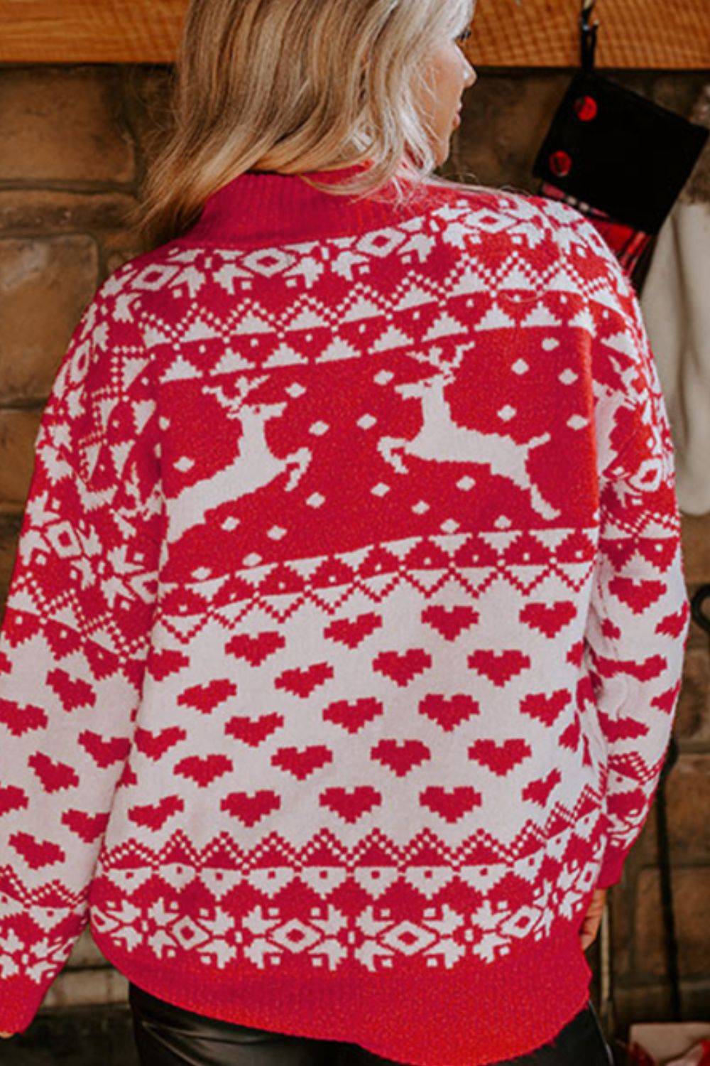 Back view of Christmas sweater with reindeer design