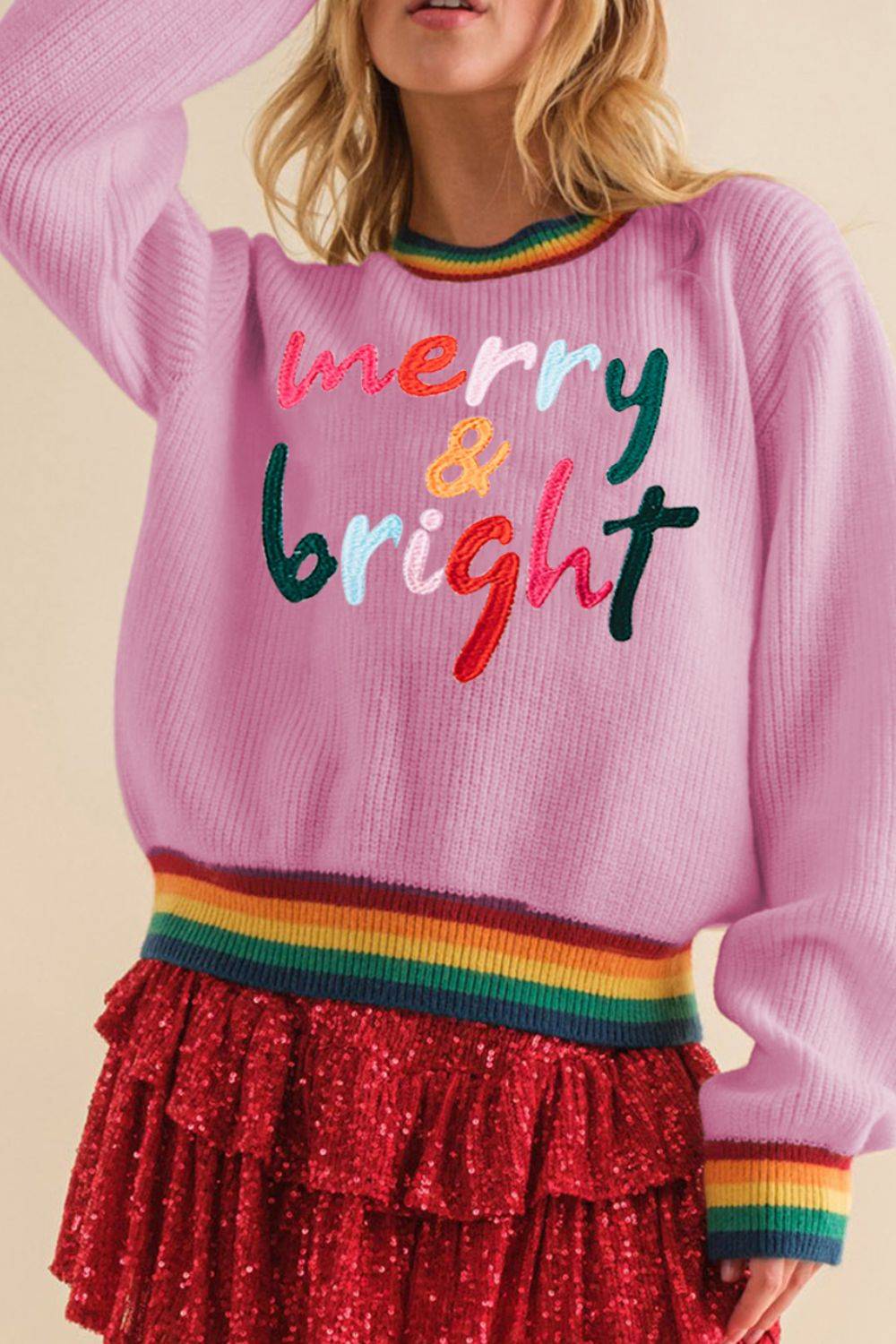 Pink ribbed sweater with &