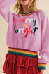 Pink ribbed sweater with &