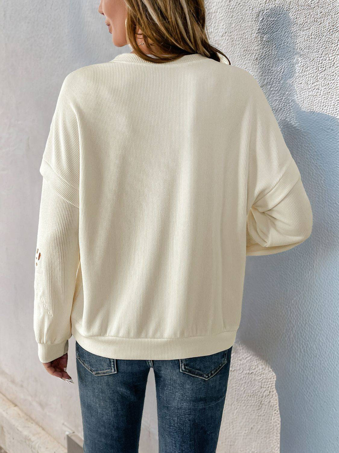 Back view of Perfee cutout round neck long sleeve sweatshirt