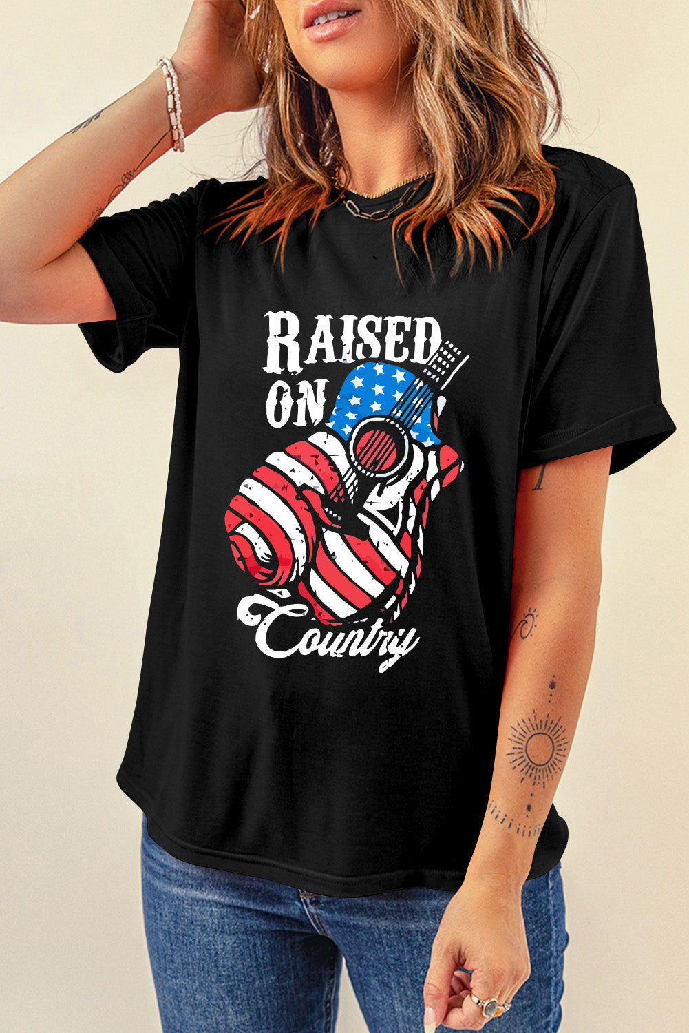 Country-themed T-shirt with American flag guitar print.