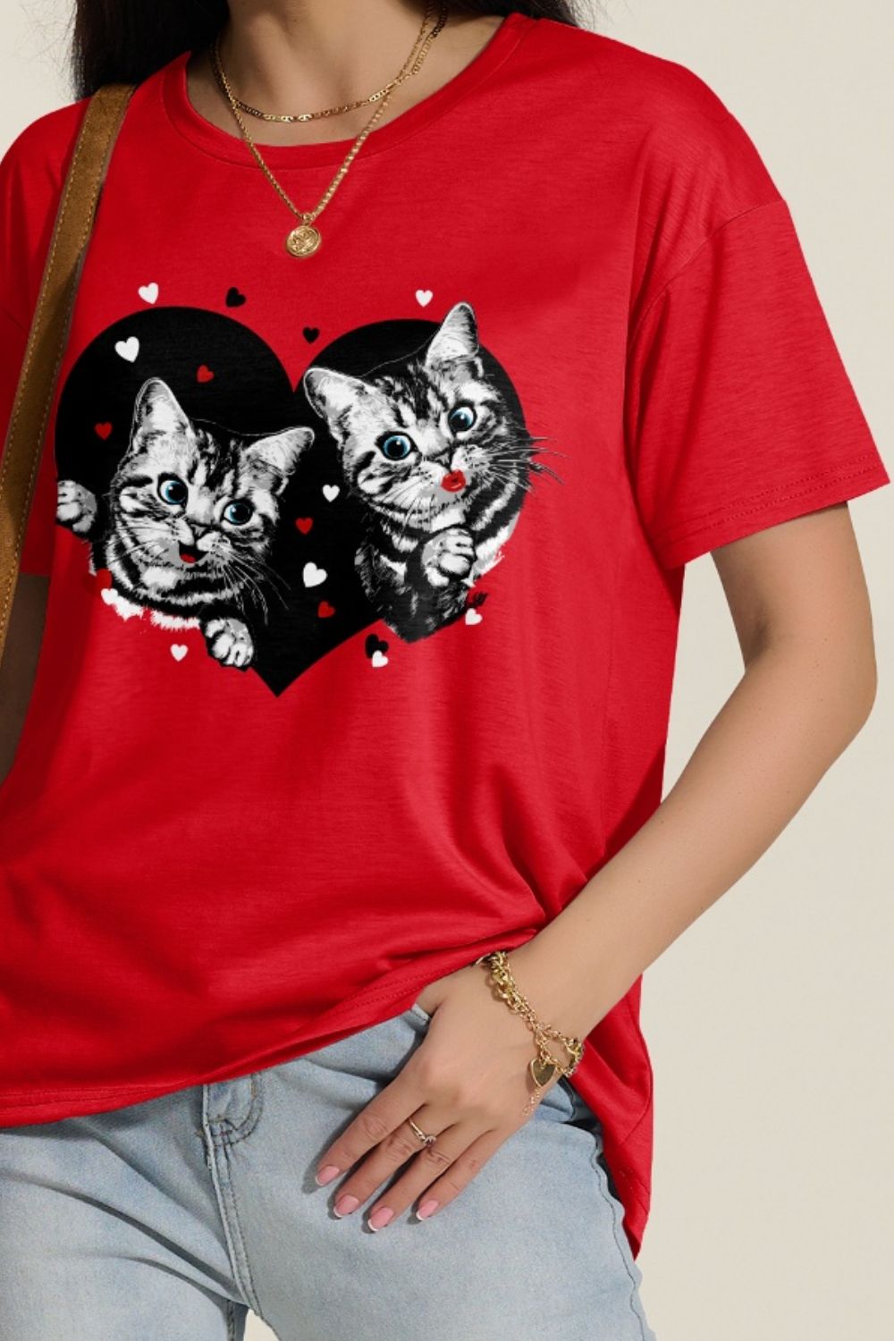 Close-up of cat print on red round neck T-shirt