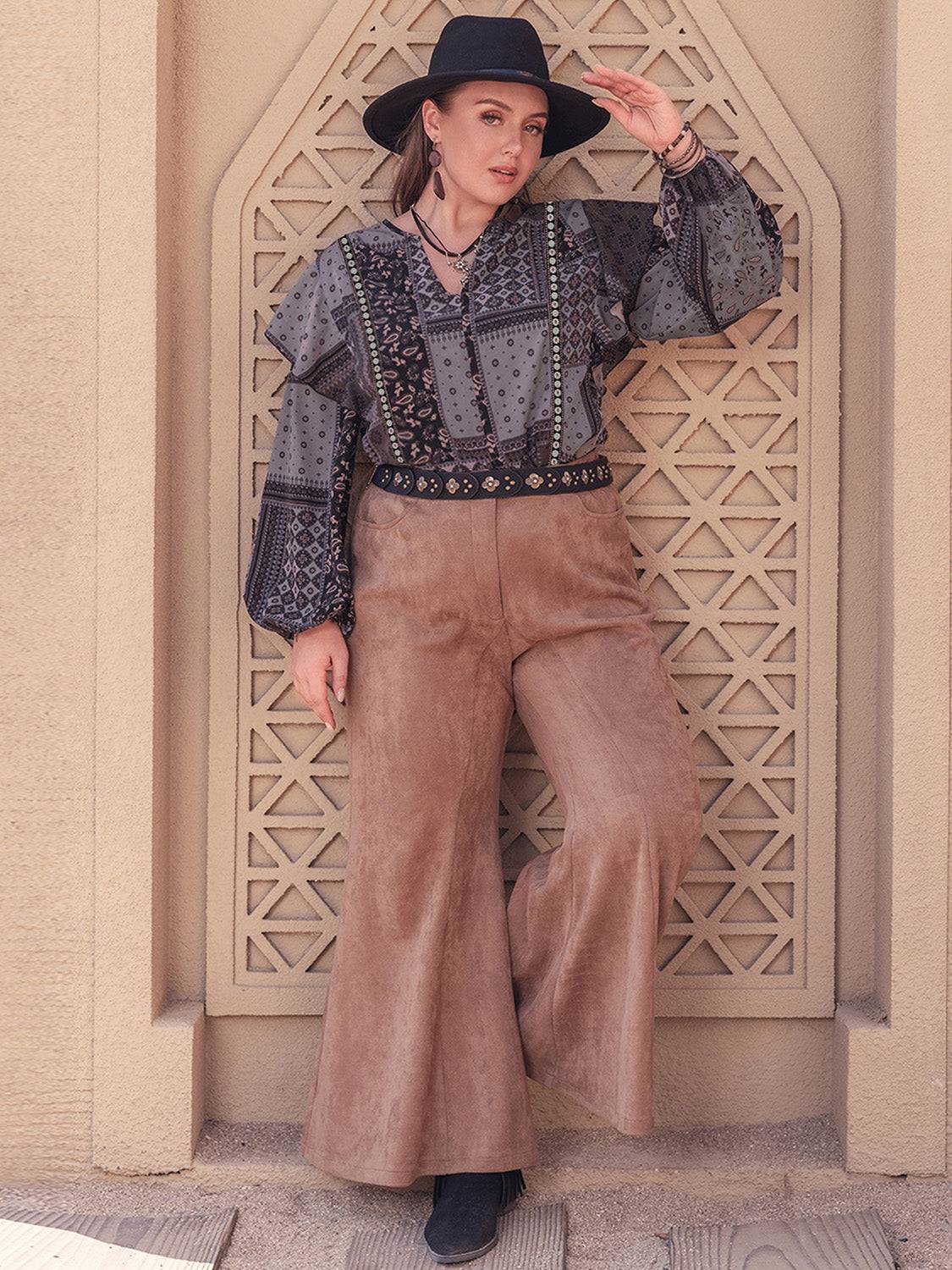 Full outfit with ruffled printed blouse and suede pants